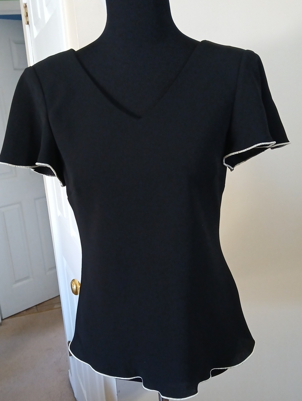 Elegant Black V-Neck Flutter Sleeve Top with Contrast Trim